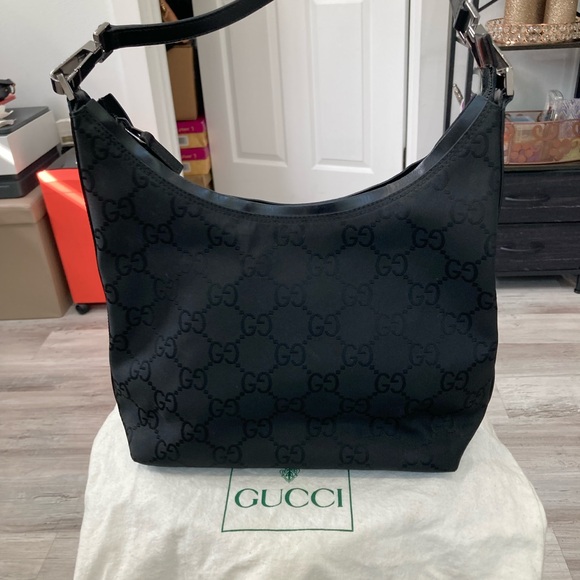 Gucci Handbags - Pre-loved Gucci Black GG Canvas Shoulder Handbag